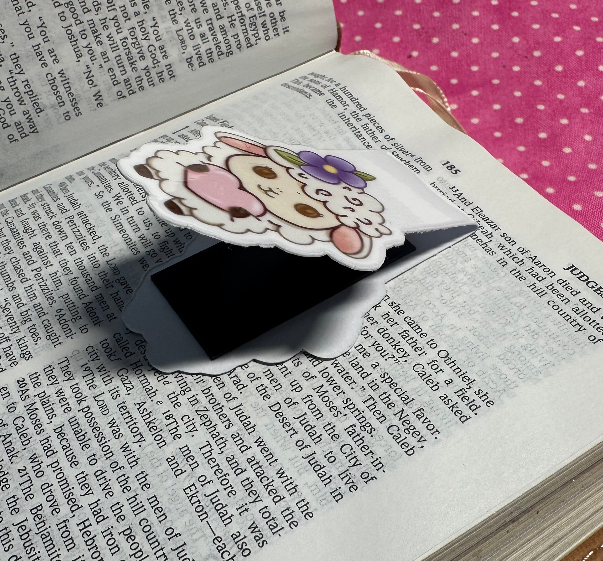 Bookmark with cartoon character on an open book
