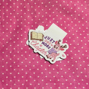 Sticker with a cartoon deer and text on a pink polka dot background