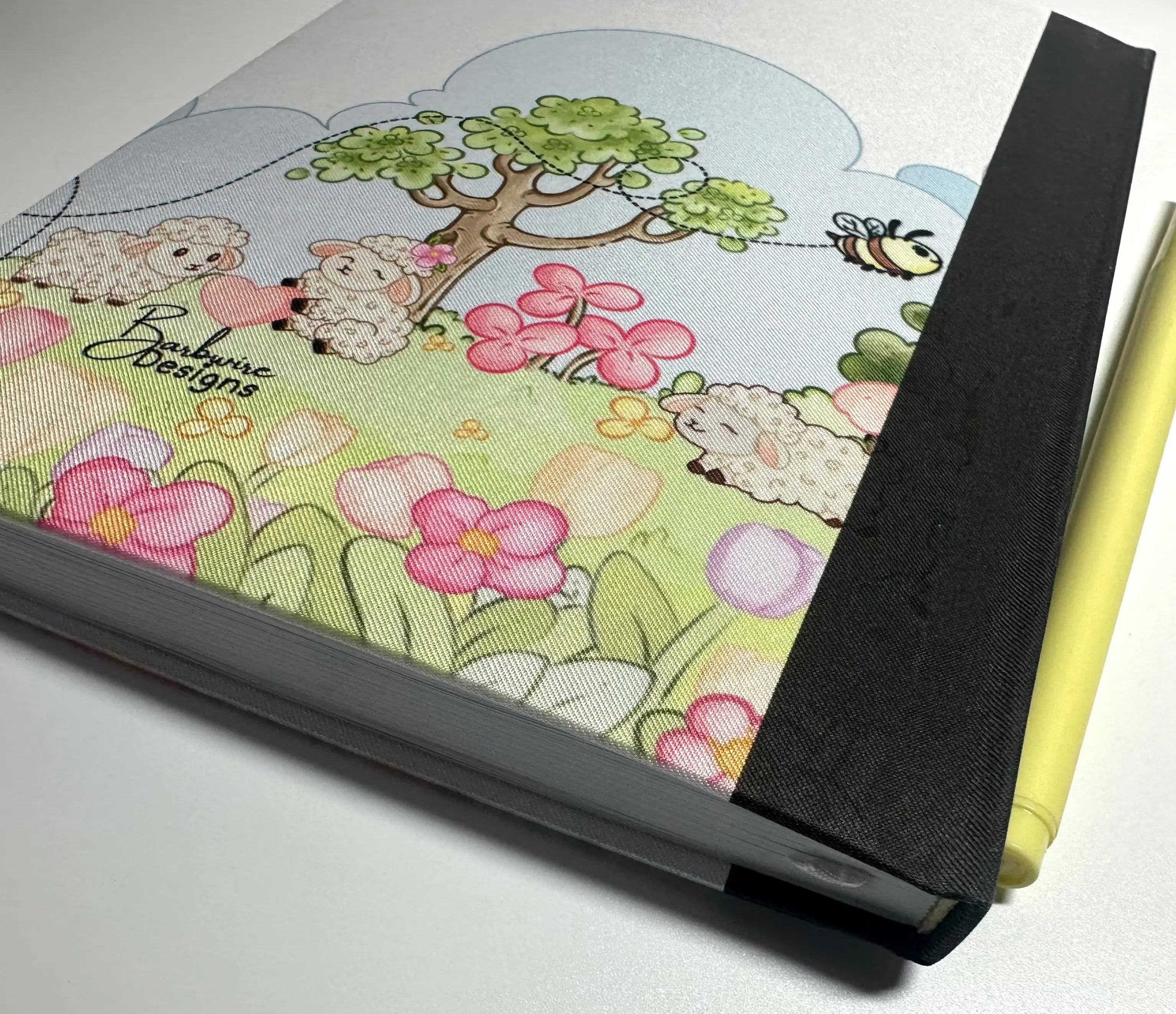 Lisa Lamb Fabric Notebook scene back closeup bottom view