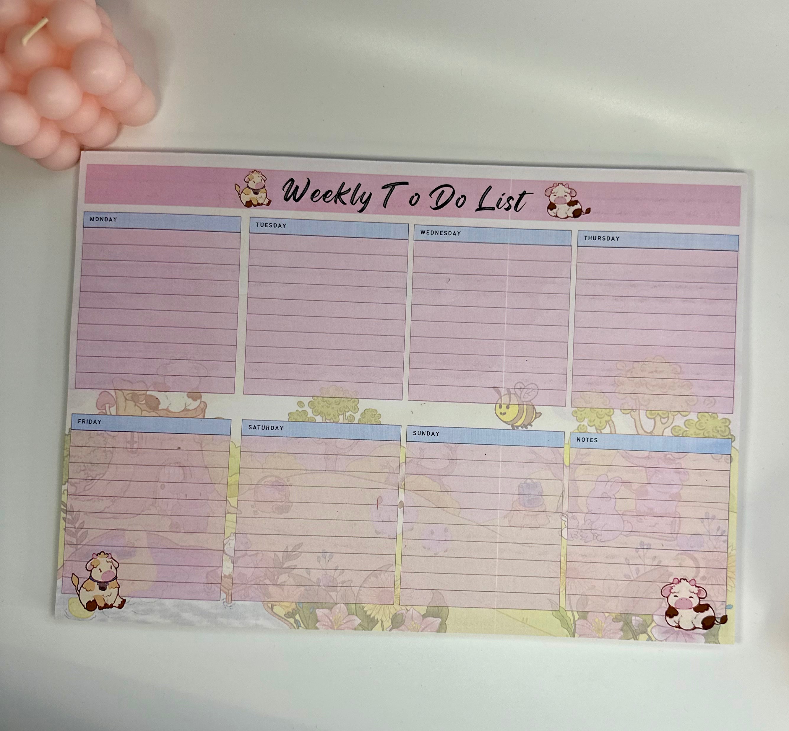 Weekly planner pad themed with daisy cow to keep you on track